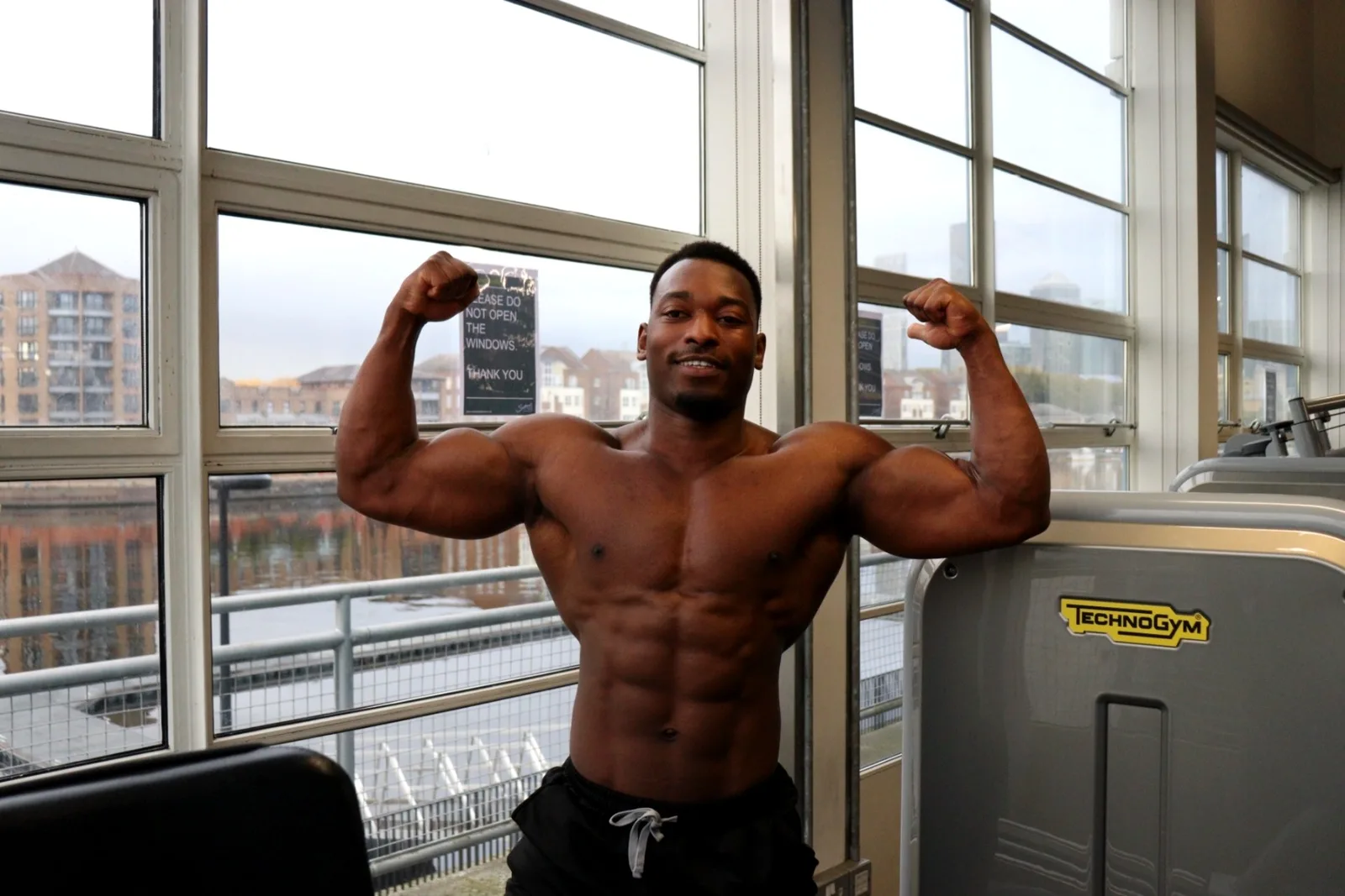 James posing in the gym